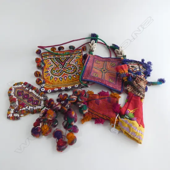 Three ethnic bags, patchwork doll, felted necklace and forehead panel.